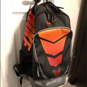 orange and black nike backpack